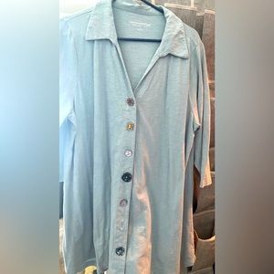 Light blue blouse with different buttons